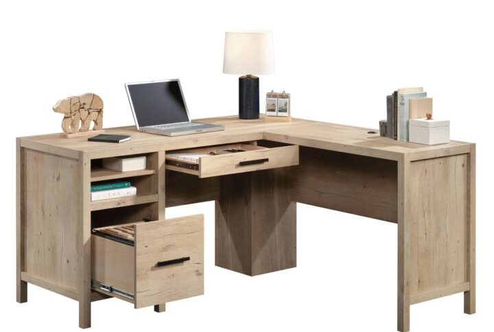 Create a rustic retreat with the L-shaped desk from the Pacific View® collection. This home office desk features a spacious top surface with enough room for your computer