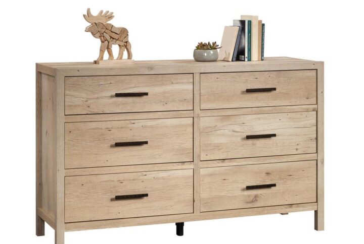 Are you seeking a bedroom dresser with a rustic vibe that is as stylish as the clothes inside of it? This 6-drawer dresser from the Pacific View® collection has the great looks you want with the expansive storage that we know you need. This bedroom dresser features six large drawers that open and close on smooth metal runners for easy-access storage of items like denim jeans