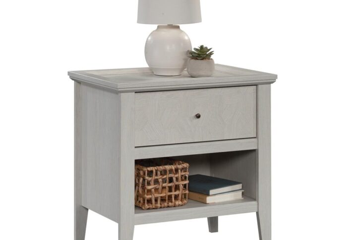 Looking to add a stylish bedside storage piece to your home? Check out this 1-drawer nightstand from the Larkin Ledge collection. This nightstand with open shelf offers a spacious top surface that provides room for bedside items - like an alarm clock