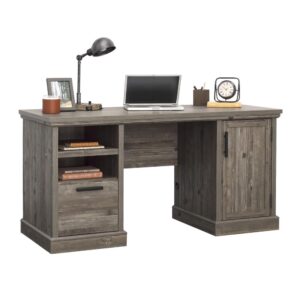 Nearly everyone has a dedicated spot in the home for desking and office duties. Make your space stand out with this double pedestal desk from the Aspen Post collection. This home office computer desk is fitted with a durable