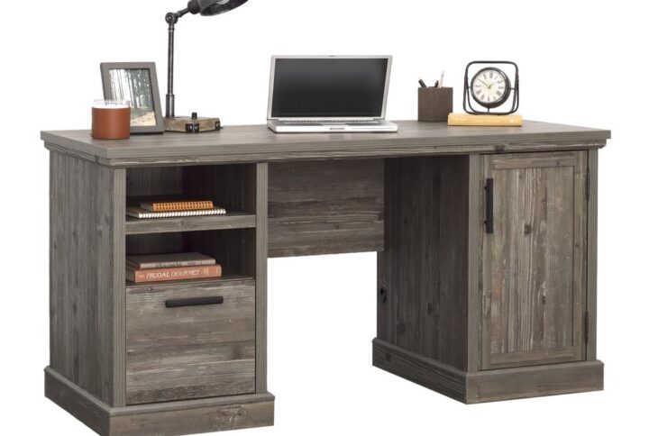 Nearly everyone has a dedicated spot in the home for desking and office duties. Make your space stand out with this double pedestal desk from the Aspen Post collection. This home office computer desk is fitted with a durable