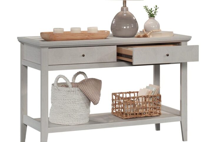 Craving a touch of refined country style? Find the edgy look you love while adding convenient storage options too with this console table with drawers and shelves from the Larkin Ledge collection. This console table with storage offers a spacious edge-captured tray top surface