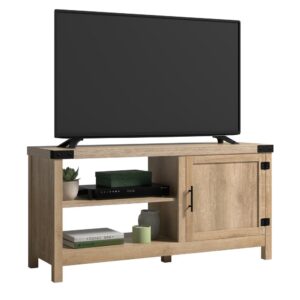 Your TV deserves a stylish partner to rest upon. Add a touch of modern farmhouse design to any room in your home with this TV stand with door from the Bridge Acre collection. This TV cabinet accommodates up to a 50" TV