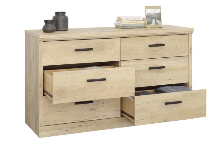 A cottage style dresser in a light and natural finish is the ultimate fresh addition to a bedroom needing a face lift. The 6-drawer dresser from the Aspen Post collection offers stylish storage and easy function. This bedroom dresser features six spacious drawers that open and close on smooth metal runners