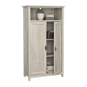 A cottage fairytale has come true with the two-door storage cabinet from the Edge Water collection. You won't find a wolf in a grandmother's clothing