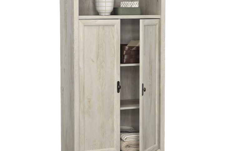 A cottage fairytale has come true with the two-door storage cabinet from the Edge Water collection. You won't find a wolf in a grandmother's clothing