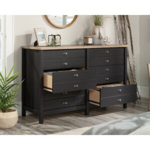 A modern dresser should have style and function at the forefront of its design. This 6-drawer dresser from the Cottage Road® collection does just that. This bedroom dresser features six spacious drawers that open and close on smooth metal runners for easy access storage of a variety of different items: from stacks of slacks and button-up shirts to your collection of leggings and cozy sweatshirts. Each drawer is detailed with attractive hardware that gives it an extra touch of style. The spacious top surface of this double dresser provides you with additional space to store other bedroom essentials and display home décor items like an accent lamp