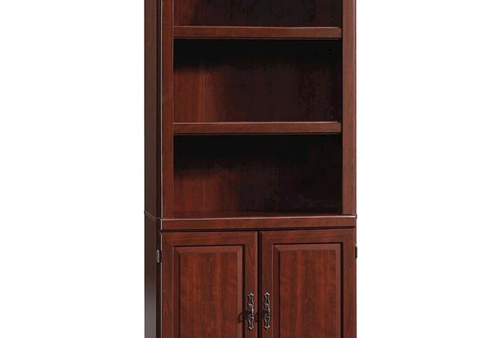 Add a touch of traditional beauty to your home with this library with doors from the Heritage Hill® collection. This tall bookcase features five shelves for convenient storage of a variety of items. This 5-shelf bookcase with doors includes three adjustable shelves