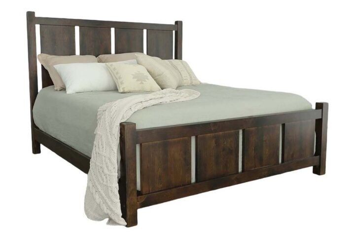 Bed features a wide vertical plank headboard and footboard with three-inch posts.Available in queen and kingVintage pine finish features a saturated brown stain with a hand applied artisan black finish over top to emulate an antique look