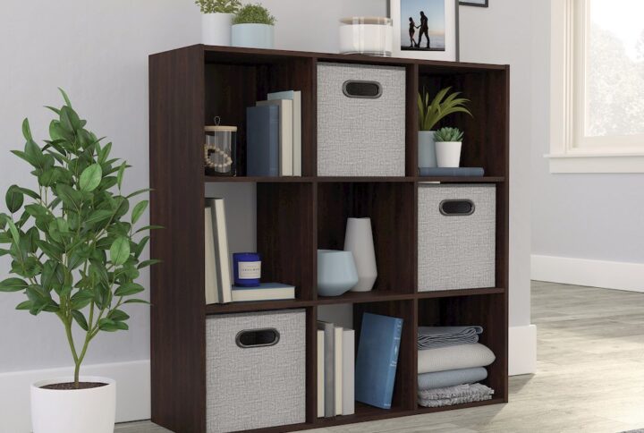 Is clutter and chaos beginning to win the fight in your home? Not for long. Find the storage and organization solution that your home needs all while adding the style that you love with this 9-cube organizer from the Sauder Select collection. This 9-cube storage cubby features a versatile design that allows you to redecorate or reposition it within your home to suit your needs. Use it as a storage bookcase because it is ideal for stowing away various items like your collection of cookbooks