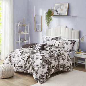 Transform your bedroom with the beautiful contrast of the Intelligent Design Dorsey Floral Print Duvet Cover Set. The ultra-soft microfiber duvet cover and sham(s) flaunt a floral print in black and white for an elegant appeal. A solid black reverse on the duvet cover complements the top of the bed with a bold touch. Two decorative pillows with hypoallergenic filling are also included to complete the bedding set. Machine washable for easy care