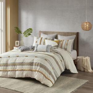 The INK+IVY Cody 3 Piece Cotton Duvet Cover Set brings a smart combination of texture and style to your bedroom. This 100% cotton duvet cover features a grey and yellow striped print with pompom and trim details for a casual