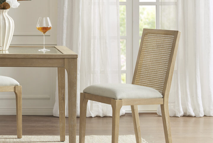 Complete your dining room setup with the Madison Park Canteberry Dining Chair 2 Piece Set. Each dining chair features a synthetic cane back with an upholstered seat