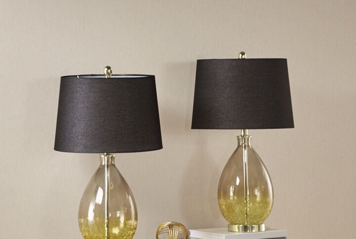 Update your space with the sleek style of the Cortina Ombre Glass Table Lamp