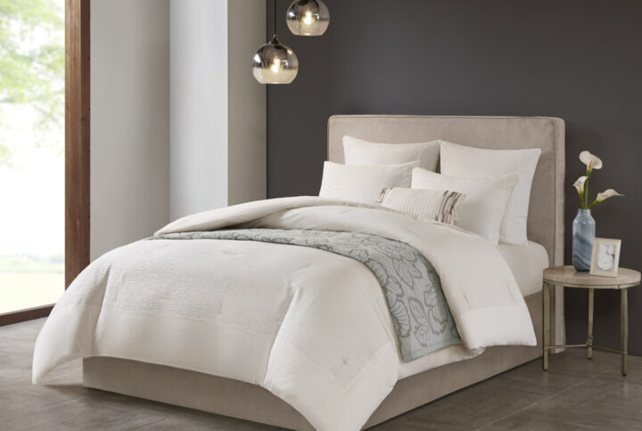 Express your unique style with yarn dyed textural appeal of the N Natori Hanae 3 Piece Comforter Set. The oversized and overfilled eggshell white comforter flaunts a textured fabric that adds dimension to the top of the bed. Two matching shams feature a textured face with a solid reverse to pair beautifully with the comforter