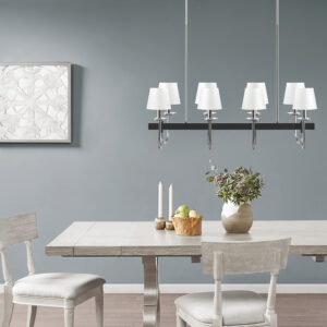 Brighten your dining area with the Hampton Hill Fairmount 8-Light Traditional Chandelier with Drum Shades. This wide rectangular chandelier features 8 uplights with distinctive drum-shaped shades that make it perfect for a farmhouse dining table or kitchen island setting. The black and silver finish creates a striking contrast that elevates the traditional design. Also included are 8 piece extension rods