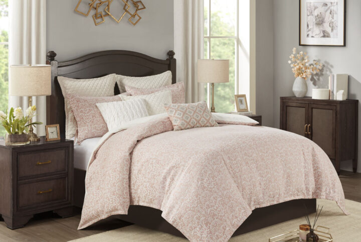 The Madison Park Signature Haven Chenille Jacquard Comforter Set introduces a subtle modern update to your bedroom. This luxurious jacquard comforter features an allover white chenille damask pattern on blush background to create a rich and elegant look. Two matching shams pair perfectly with the comforter