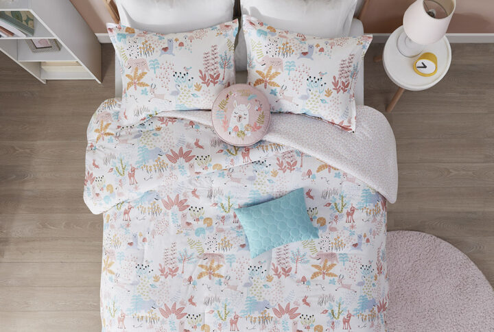 Cuddle up with your favorite animal friends with the Urban Habitat Kids Iris Woodland Animals Cotton Reversible Comforter Set. This cotton comforter features cute woodland creatures in a forest with a ditsy floral pattern on the reverse. The 2 matching shams (1 in Twin) repeat the pattern of the woodland animal comforter to create an adorable and whimsical look. Also included are 2 decorative pillows to complete the reversible comforter set. This kid's comforter set is OEKO-TEX certified