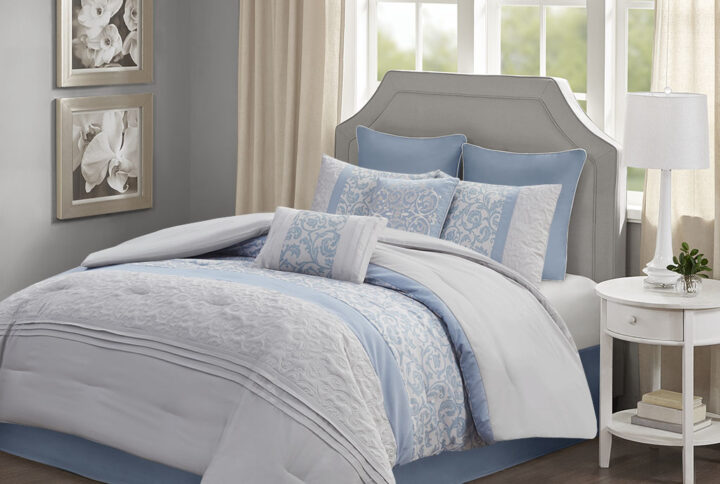 The 510 Design Ramsey Embroidered 8 Piece Comforter Set introduces a graceful elegance to your bedroom decor. A pieced embroidery design with quilting and pintuck details