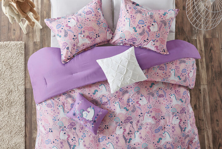 Add a touch of whimsy to your child’s bedroom with the Urban Habitat Kids Lola Unicorn Cotton Comforter Set. Adorable unicorns prance across the top of the comforter and matching shams (1 for Twin Sizes) in bright colors. The solid reverse highlights the fun print on the comforter