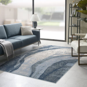 The Madison Park Grace Abstract Wave Area Rug offers a modern and artistic update to your home decor. This area rug features a soft