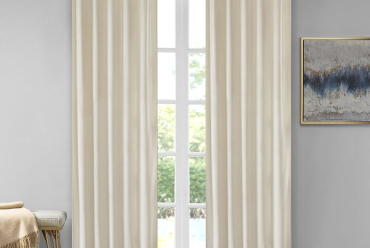 Accentuate your home with the 510 Design Colt Poly Velvet Window Panel Pair. Made from soft solid ivory poly velvet