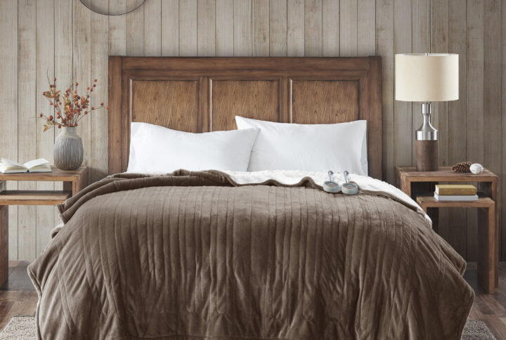 Sleep in ease in the Woolrich heated blanket with Secure Comfort Technology