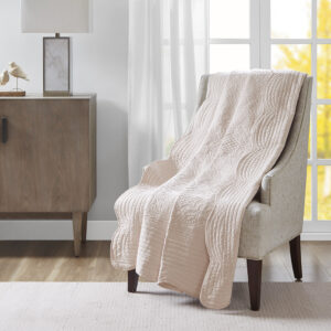 Tuscany is the perfect quilted throw for a new solid look. The decorative stitch pattern pairs easily with your existing decor and will sure to add a new decorative element with the beautiful scalloped edges. This quilted throw is filled with cotton filling and features a polyester microfiber fabrication on the face and the reverse. Its prewashed finish gives a worn in appearance to this decorative throw.