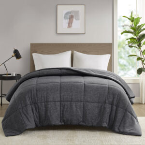 Dive into this cool and comfortable jersey knit down alternative comforter. Made from 50% nylon and 50% polyester