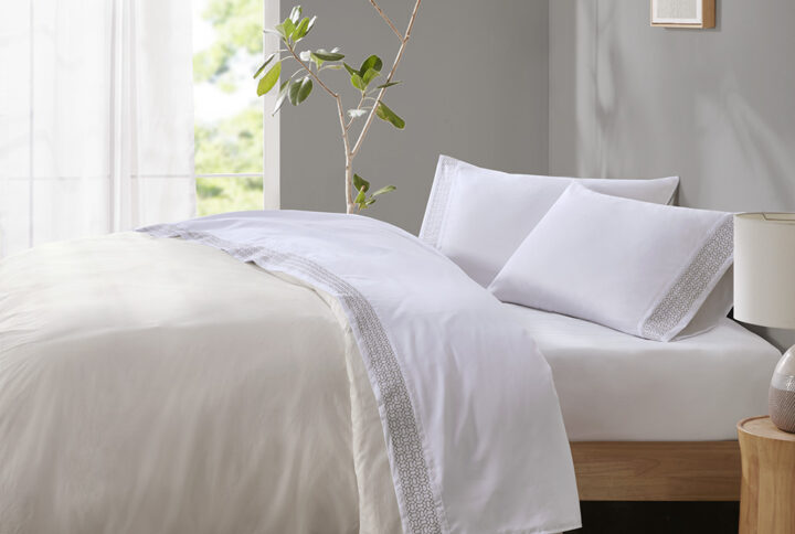 Style your bed with the simple elegance of the Madison Park Embroidered Microfiber Sheets. This solid microfiber sheet set features a beautiful embroidered hem that adds a refined touch and brings a pop of color to your bedroom. Embroidery is featured on the flat sheet and pillowcase hem face side only. The fitted sheet fits mattresses up to 16". Made from ultra-soft microfiber