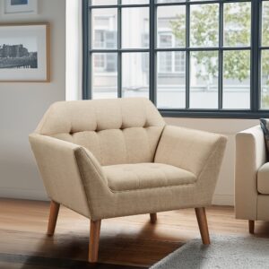 Elevate your living area with the mid-century allure of the INK+IVY Newport Upholstered Armchair. Featuring a wide 37-inch profile and a striking angular silhouette