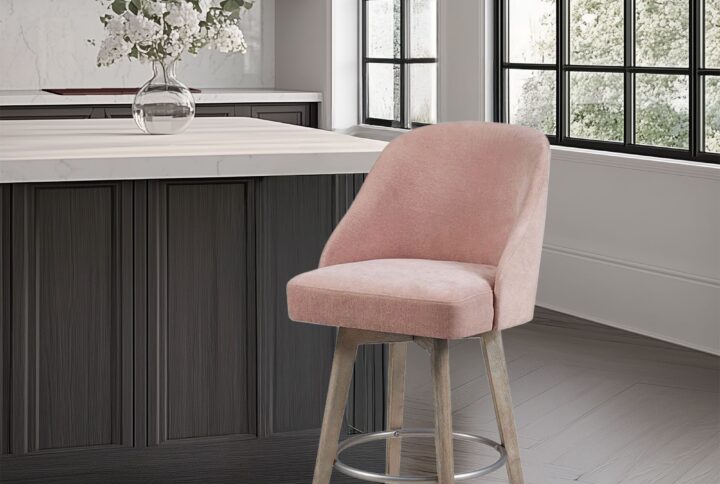 Elevate your kitchen or dining space with the Madison Park Pearce Swivel Counter Stool