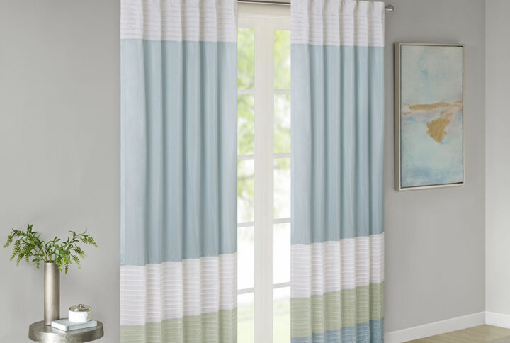 Madison Park Amherst Polyoni Pintuck Window Curtain is a simple way to add style to your room. This window panel features a modern striped design in soft hues of green