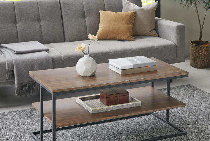 Complete your living room with the sleek style of the 510 Design Monarch 42" 2 Tier Rectangle Metal Frame Coffee Table. This rectangular coffee table features open shelves with a dark coffee finish and a black metal frame