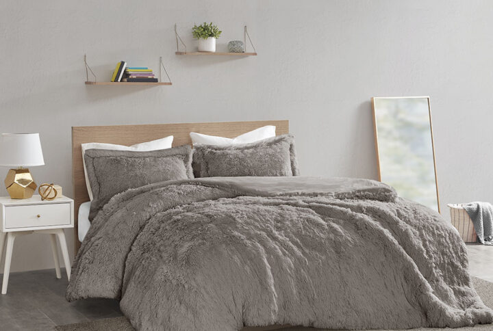 The Intelligent Design Malea Shaggy Fur Duvet Cover Set brings a soft contemporary update to your bedroom. The duvet cover and shams (1 in Twin/TwinXL) features stylish shaggy faux fur that creates a soft fluffy texture. The solid plush reverse adds a soft and warm touch. A zipper closure secures a padded insert within the duvet cover and inside corner ties prevent it from shifting (insert is NOT included).