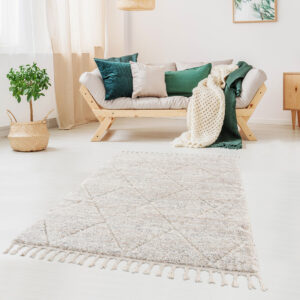 Bring a soft and elegant touch to your home decor with the Madison Park Sophia Talas Shag Area Rug. This machine woven