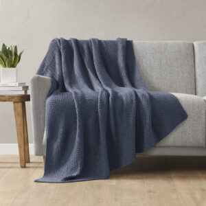 Bundle up in the warm and cozy comfort of the INK+IVY Bree Knit Throw. This ultra-soft