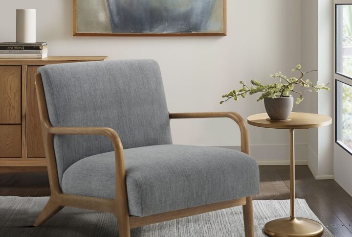 Transform your space with the INK+IVY Novak Mid-Century Modern Armchair. Crafted with a solid wood frame in a natural finish