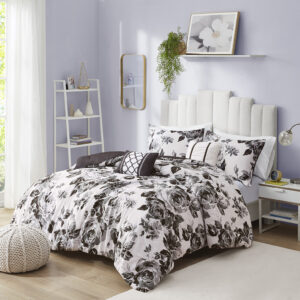 Transform your bedroom with the beautiful contrast of the Intelligent Design Dorsey Floral Print Comforter Set. The ultra-soft microfiber comforter and sham(s) flaunt a floral print in black and white for an elegant appeal. A solid black reverse on the comforter complements the top of the bed with a bold touch. Two decorative pillows with hypoallergenic filling are also included to complete the bedding set. Machine washable for easy care