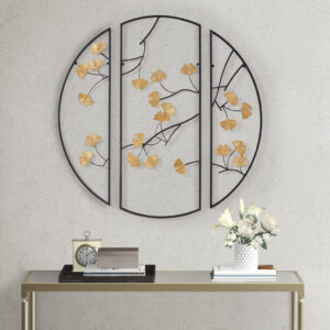 creating a striking contrast with the black metal branches and frame. All three pieces