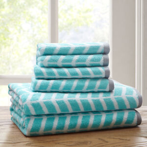 Add the Intelligent Design Nadia 6 Piece Towel Set to your bathroom for a fun and bright update! These 2-ply ring spun towels are cotton jacquard woven making them reversible in contrasting colors as well as incredibly absorbent. Each towel features a rich aqua color geometric print with a small dobby border. These cotton towels are also Made in Green by OEKO-TEX certified