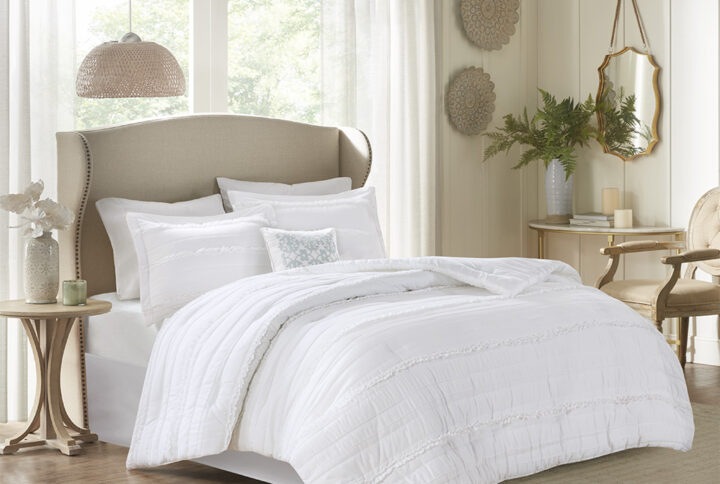 Elevate your bedroom with the Madison Park Celeste 5 Piece Ruffled Comforter Set