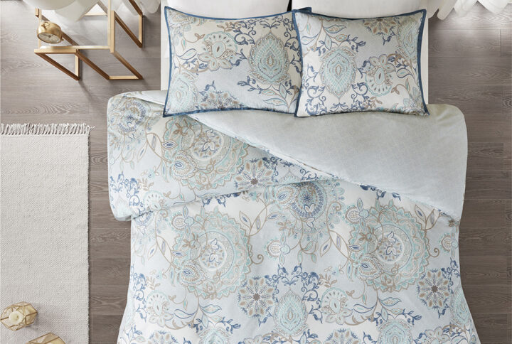 Refresh your bedroom with the Madison Park Isla 3 Piece Cotton Printed Reversible Duvet Cover Set. The 100% cotton duvet cover and shams flaunt a botanical floral design with a medallion motif printed in soft watercolor hues. A printed pattern on the reverse complements the top of the bed