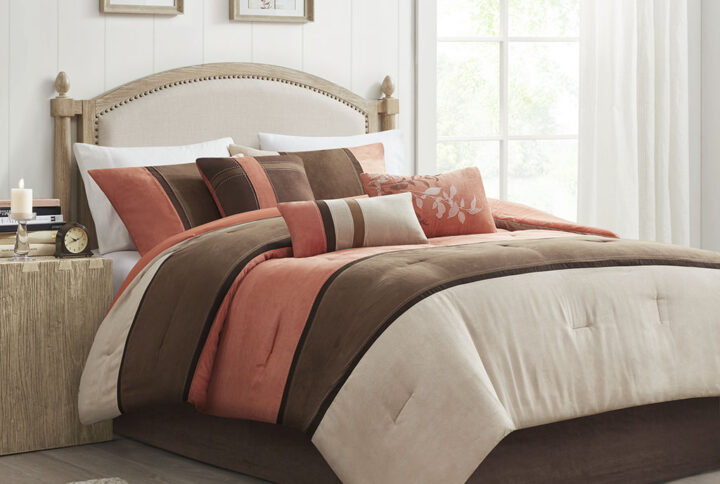 The Madison Park 7 Piece Palisades Comforter Set offers you a casual alternative in fashion bedding. The reverse of the comforter is solid coral. The soft microsuede in ivory