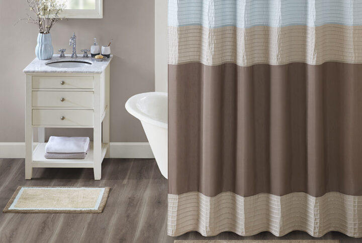 The Madison Park Amherst Cotton Tufted Bath Rug Collection provides a stylish and sophisticated look for your bathroom. Made from 100% tufted cotton