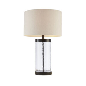 Add an elegant charm to your home with the INK+IVY Macon Glass Cylinder Table Lamp. This stylish table lamp is made from a painted bronze metal and a clear glass base that adds dimension and charm. A drum shade shape helps accentuate the design. Illuminate your living room or bedroom with this gorgeous table lamp. One Type A light bulb is needed and included.