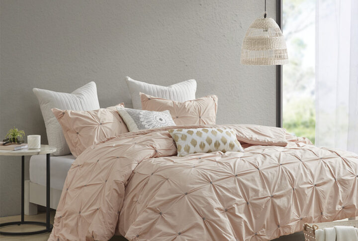 Elevate your bedroom with the INK+IVY Masie 3 Piece Elastic Embroidered Cotton Duvet Cover Set. This solid cotton duvet cover features elastic and embroidered details on the face to create a tufted-inspired design with a modern flair. The 2 matching shams handsomely pair with the cotton duvet cover to complete this modern and sophisticated bedding set. This cotton duvet cover set uses an antimicrobial treatment that provides built-in freshness protection