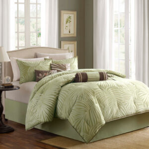 Transform your bedroom into a tropical oasis with the Madison Park Freeport 7 piece comforter set. This set showcases palm prints on polyester jacquard fabric in olive green and dark beige that create a relaxing vibe. The taupe piping lends a classy touch and the matching pillows accentuate the palm tree and floral motif. Three decorative pillows with embroidery and fabric manipulation details in contrasting colors of browns and taupe enhance the bed with texture and dimension. Machine washable for easy care.