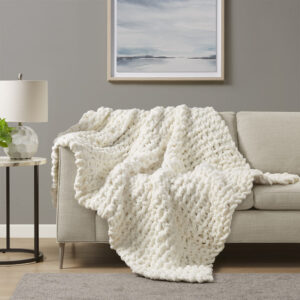 Indulge in pure comfort by wrapping yourself in the Madison Park Chenille Chunky Knit Throw. This chunky knit throw is handmade from luxurious chenille yarn to create a soft and cozy feel that's perfect to snuggle up in. The chunky knit throw is also OEKO-TEX certified