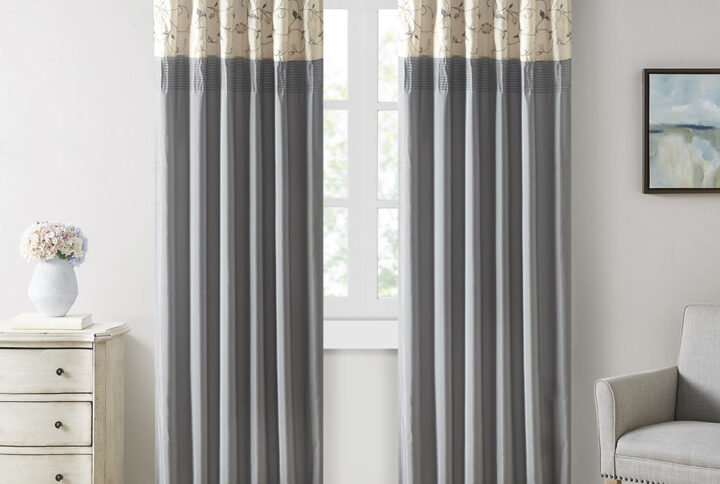 Add simple elegance to any room with the Madison Park Serene Embroidered Window Panel. This window curtain features delicate floral embroidery in soft sage and neutral hues